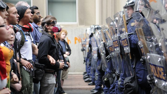 Police standoff with protesters