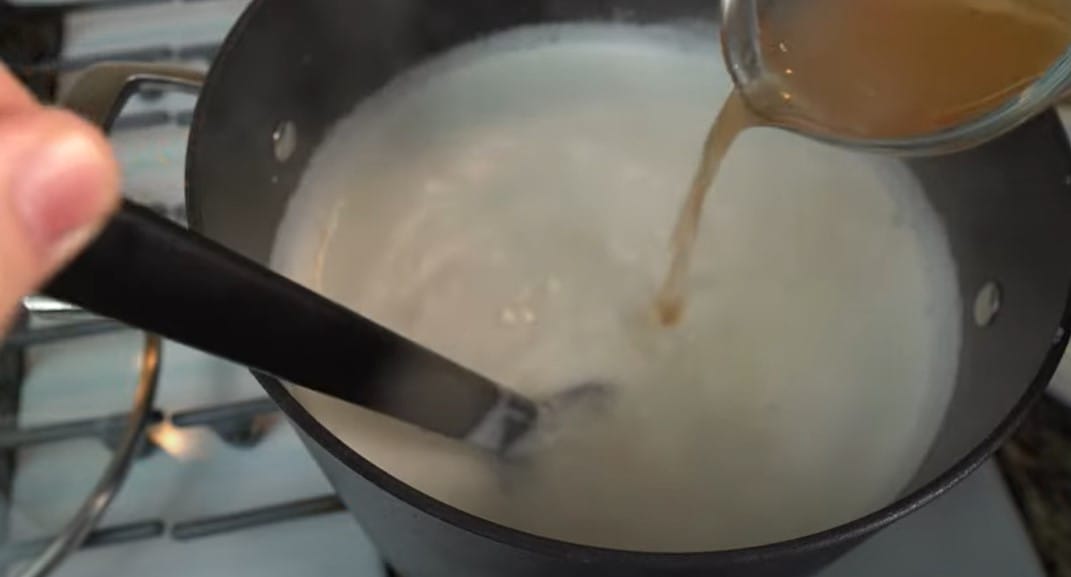 Pour the vinegar into the milk